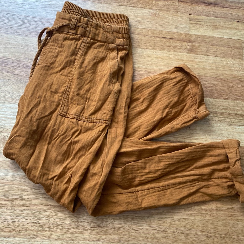 Cropped camel color linen-like pants.